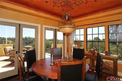 Formal dining with deck access.
