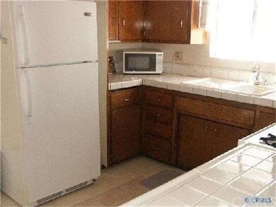 Kitchen open to dining and living room