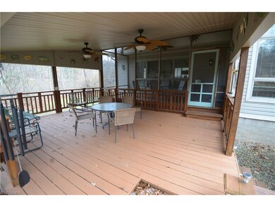covered portion of deck & entry to screened portio