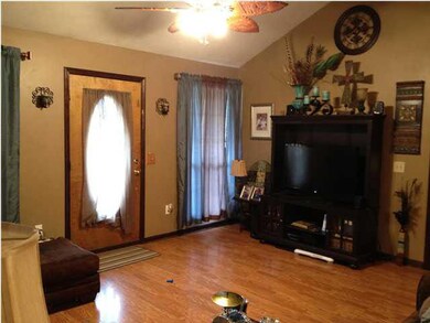 Living room with vaulted ceiling