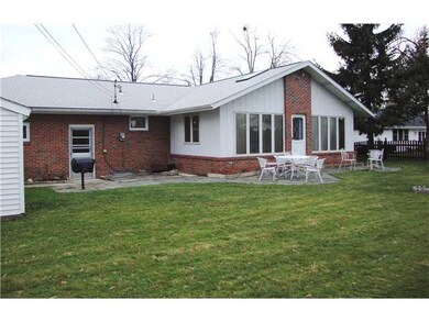 Exterior Back. Rear of house showing Family room a