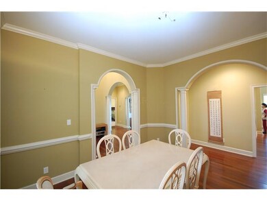 Beautiful archways surround the formal dining area