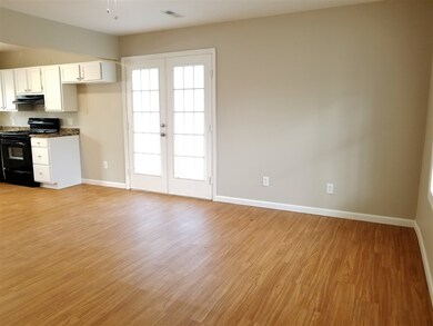This view of the greatroom shows the french doors 