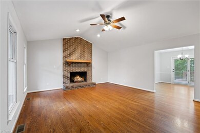 family room.  Fire is virtually staged.