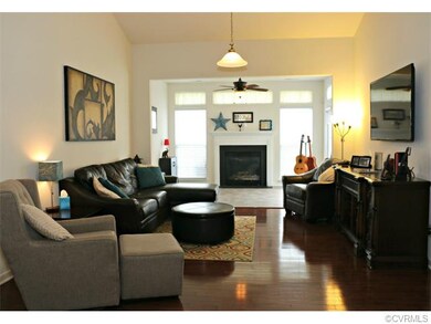 Family room-  hardwood floors, light pendant, larg