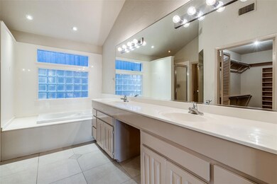Bathroom with tile patterned floors, vanity, indep