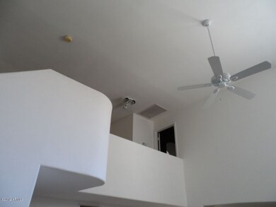 VIEW OF LOFT AREA AT TOP OF STAIRS
