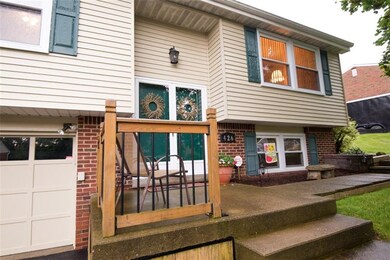 This home features a double door entryway and  fro