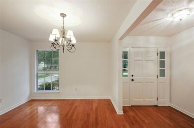Real wood floors in dining & living areas plus fre