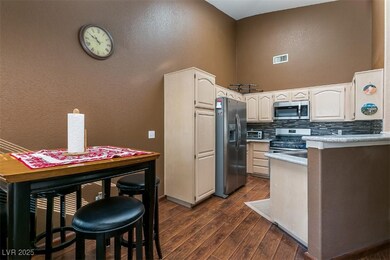 Kitchen with appliances with stainless steel finis