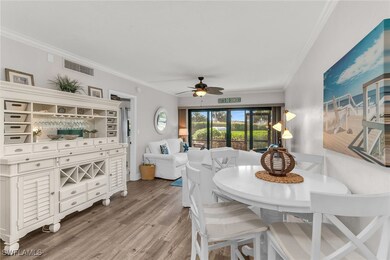 Dining room featuring wood finished floors, visibl