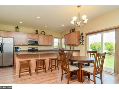 Large kitchen with stainless steel appliances and 