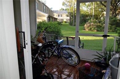 screened patio with view of garden