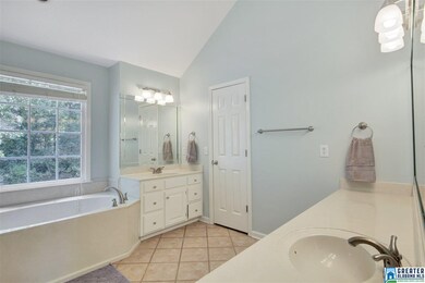 has a vaulted ceiling for extra spaciousness, and 