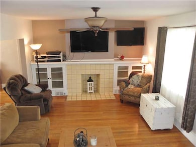 Living Room. MASSIVE 21x13 Living Room w/ Attracti