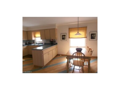 Eat In Kitchen and Hardwood Floors