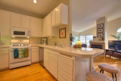Kitchen Opens to Dining and Living Spaces.