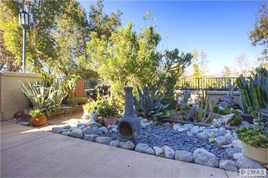 Enjoy your large, private back yard and patio with a view of the mountains, O'Neil park and your own private fountain and pond.