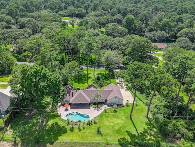 This aerial backyard view showcases the home’s gen