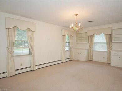 Formal dining room with built ins.