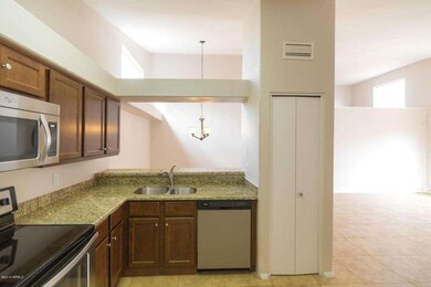 Kitchen Overlooks Dining Room