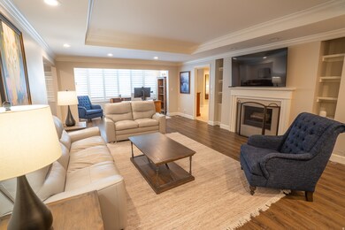 Living area w/fireplace and recessed lighting
