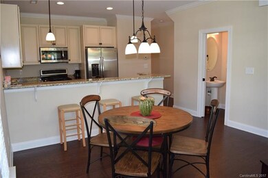 Breakfast area, bar, kitchen and half bath