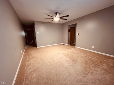 Walk down the hallway to the bedrooms and bathroom.