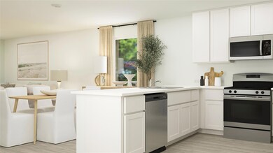 Kitchen with kitchen peninsula, stainless steel ap