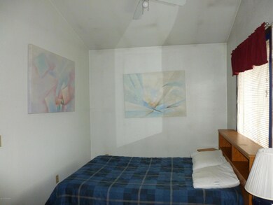 Bedroom w/vaulted ceiling and fan!
