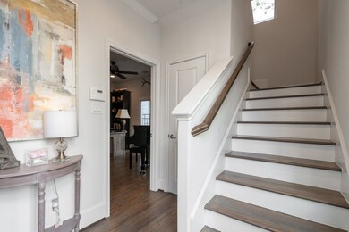 As you enter this lovely home, you'll notice the c