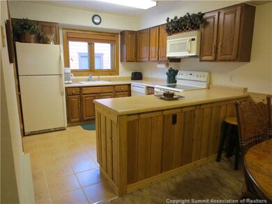Kitchen. Clean, bright kitchen with new hard tile