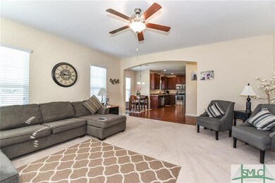 Living Room off of breakfast area and kitchen