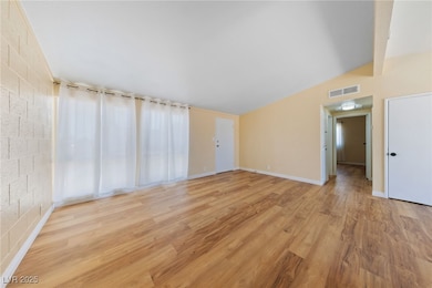 Unfurnished room featuring light wood-style floori