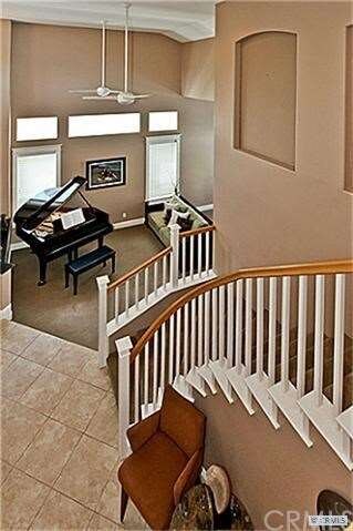Graceful staircase to living area