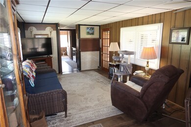 Warm, wood-tone finishes.  Custom plantation shutt