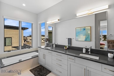 Primary bath with soaker tub, dual sink, walk in s