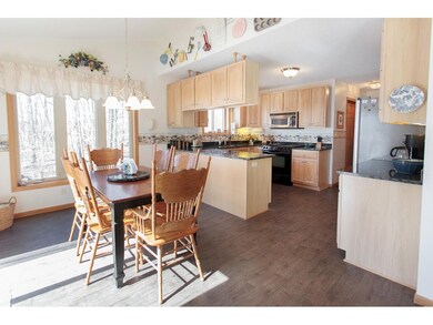 Dining room and kitchen.