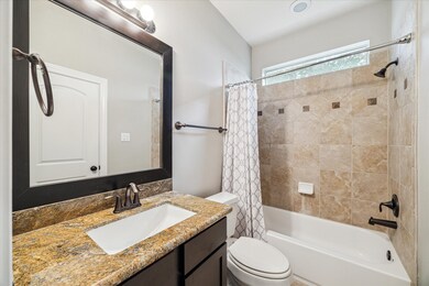 First floor bedroom ensuite bath