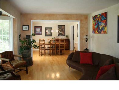 Newer wood floors in formal living room and dining