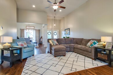 The living room is at the center of an open floor plan. Excellent for entertaining. 