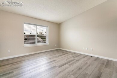 Empty room with light wood-type flooring, a textur