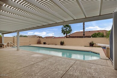 Large covered patio near pool