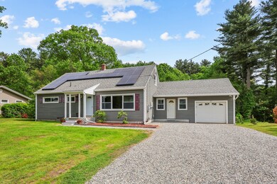 NEW wide stone driveway leading to 1-car attached garage.