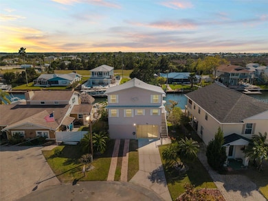 Three Story Waterfront Home on a Canal that Goes to the GULF