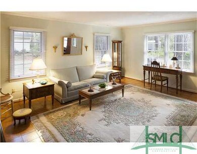 Living Room. Lots of light and pretty floors