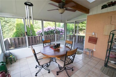 Ceramic tile 3-season room with sky lights and acc