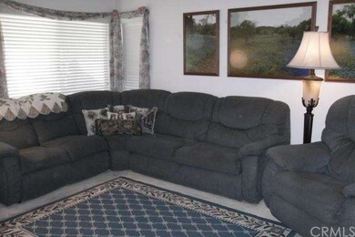 Living room is spacious enough for a large section