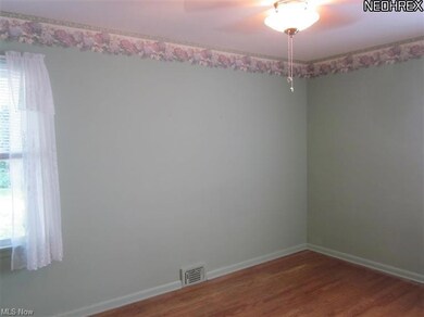 Bedroom with stunning floors, newer windows and pr