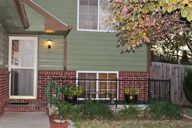Inviting front porch with cover over front door.